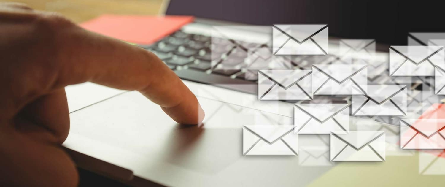 hand-tounching-laptop-many-envelopes